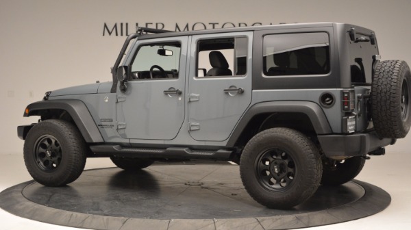 Used 2014 Jeep Wrangler Unlimited Sport for sale Sold at Maserati of Greenwich in Greenwich CT 06830 4