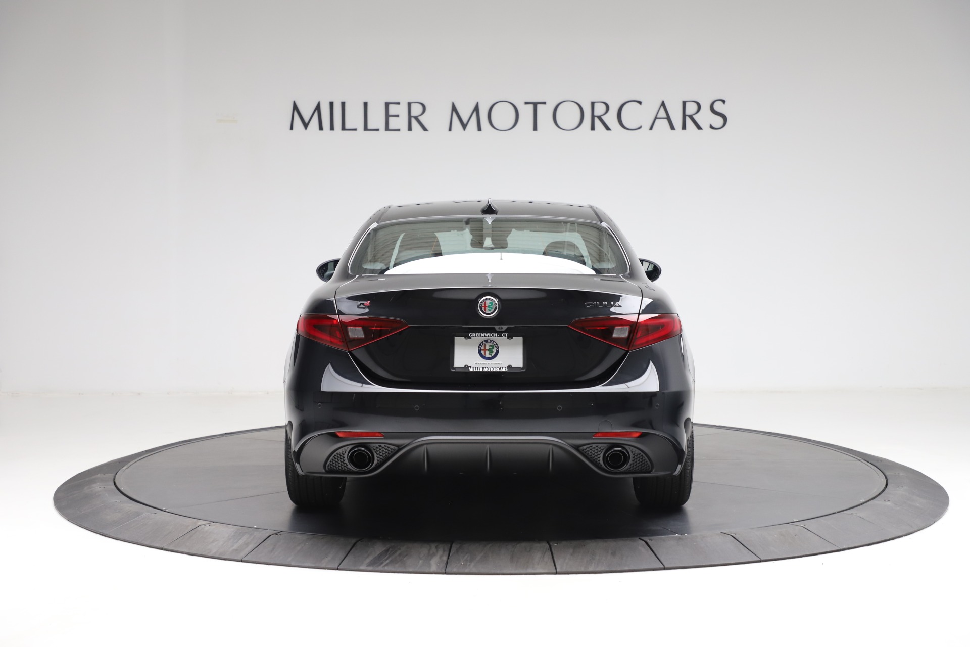 Genuine Alfa Romeo Q4 Rear Emblem – Black – For Giulia, Tonale – OEM 50556908